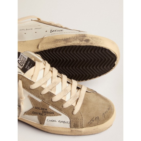Super-Star sneakers in white leather with dove-gray suede inserts and all-over black lettering