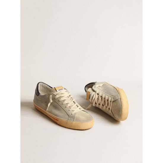 Super-Star in gray nubuck with perforated star and blue heel tab