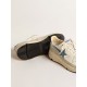 Running Sole in nappa with blue leather star and suede insert