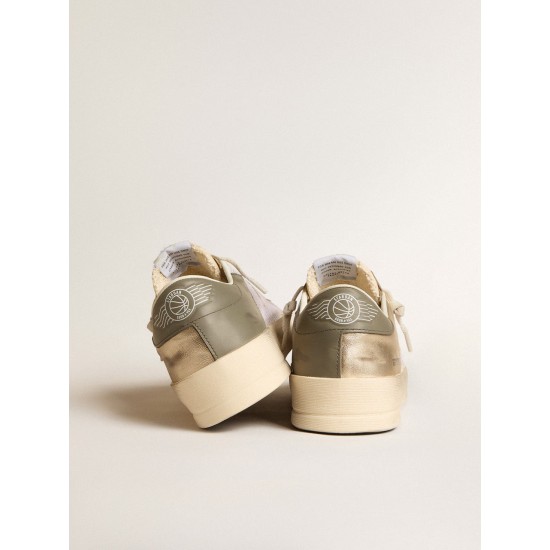 Stardan in white mesh with orange star and platinum leather inserts