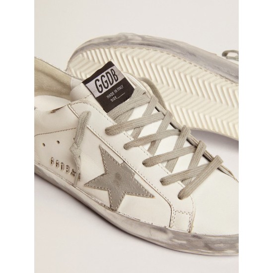 Women's Super-Star with silver sparkle foxing and metal stud lettering