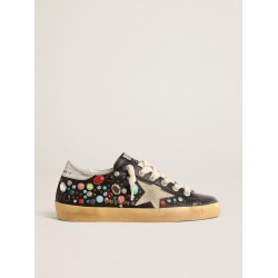 Super-Star LTD with multicolored studs and beige suede star