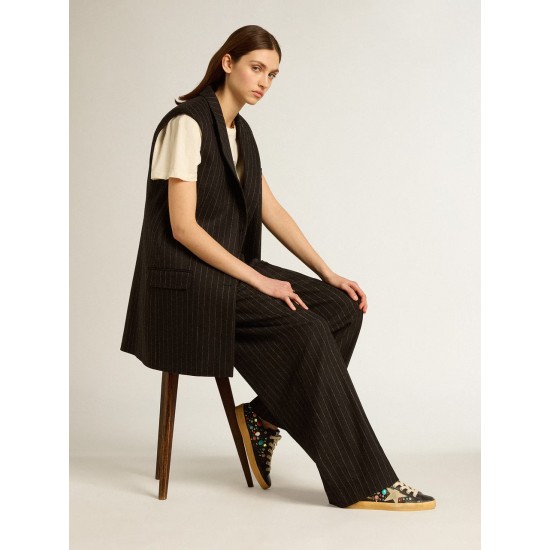 Super-Star LTD with multicolored studs and beige suede star