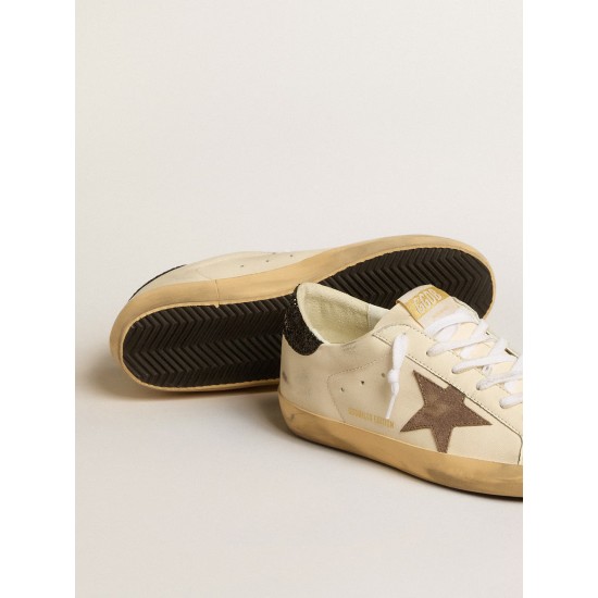 Super-Star LTD with laminated leather star and black glitter heel tab