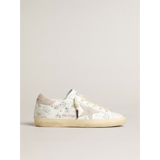 Women’s Super-Star LTD CNY in white leather with lettering on the upper