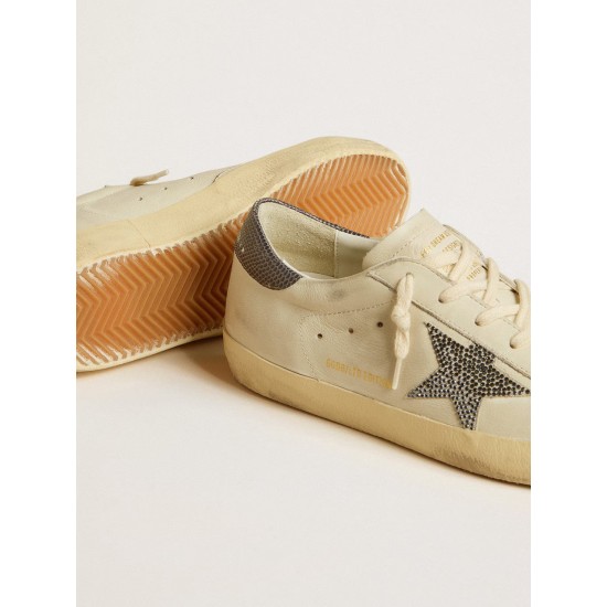 Super-Star LTD with cream-colored leather star with Swarovski crystals and blue leather heel tab with lizard print