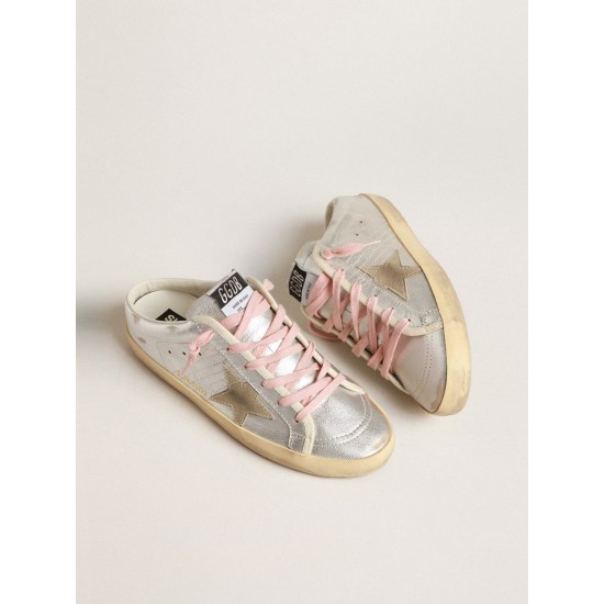 Super-Star Sabots in silver metallic leather with suede star