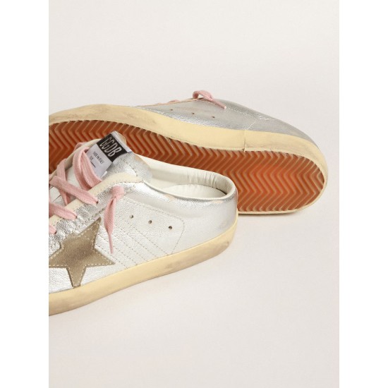 Super-Star Sabots in silver metallic leather with suede star