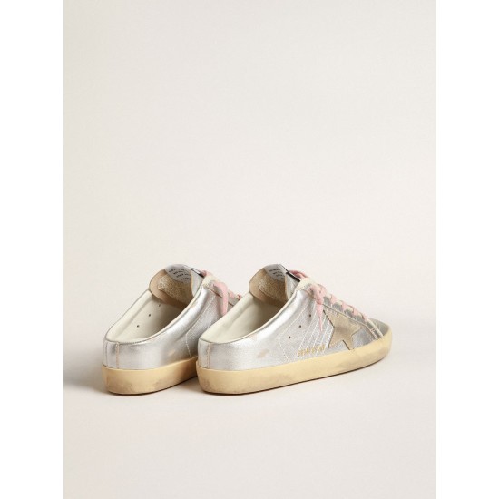 Super-Star Sabots in silver metallic leather with suede star
