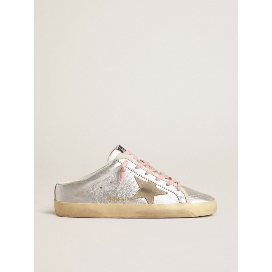 Super-Star Sabots in silver metallic leather with suede star