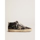 Women's Mid Star in black glitter with dove-gray suede star and heel tab