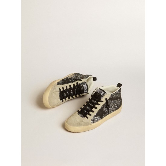 Mid Star LTD in black glitter with black leather star and flash