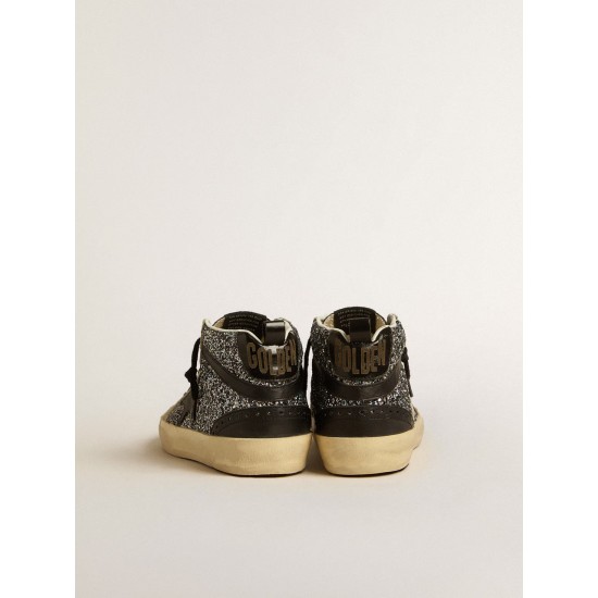 Mid Star LTD in black glitter with black leather star and flash