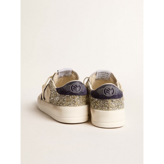 Stardan in platinum glitter with dark blue suede star and heel tab