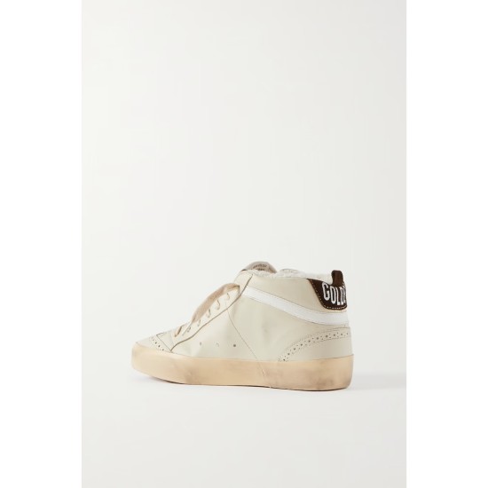 Superstar distressed shearling-lined rubber and leather sneakers