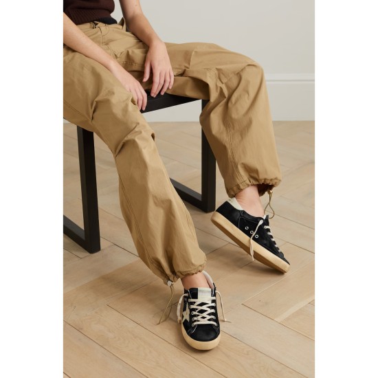 Superstar distressed leather-trimmed suede sneakers