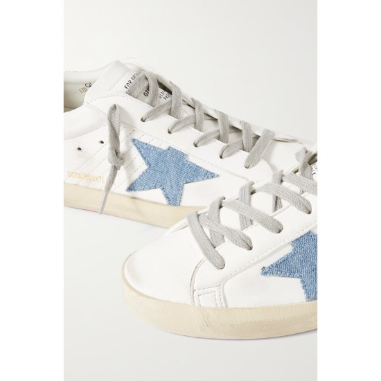 Superstar distressed denim-trimmed glittered leather sneakers