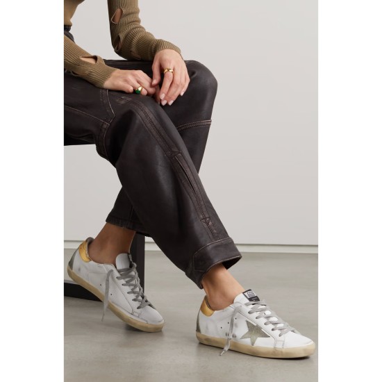 Superstar distressed leather and suede sneakers