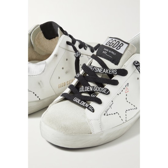 Superstar distressed leather and suede sneakers