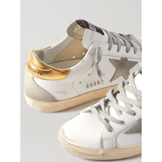 Superstar distressed leather and suede sneakers