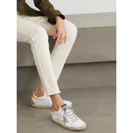 Superstar distressed leather and suede sneakers