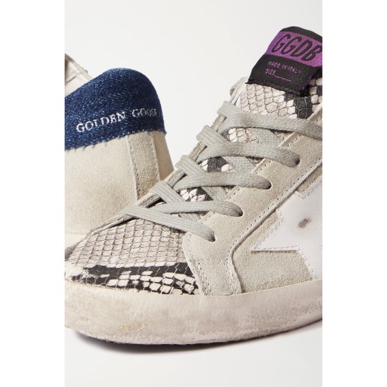 Superstar denim-trimmed distressed snake-effect leather and suede sneakers